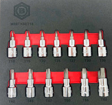 A set of 13 3/8" drive Torx star bit sockets from the Britool Hallmark range, arranged in order from T10 to T60, displayed in red and black foam inserts.